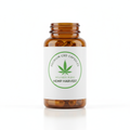 CBD capsules in an amber bottle
